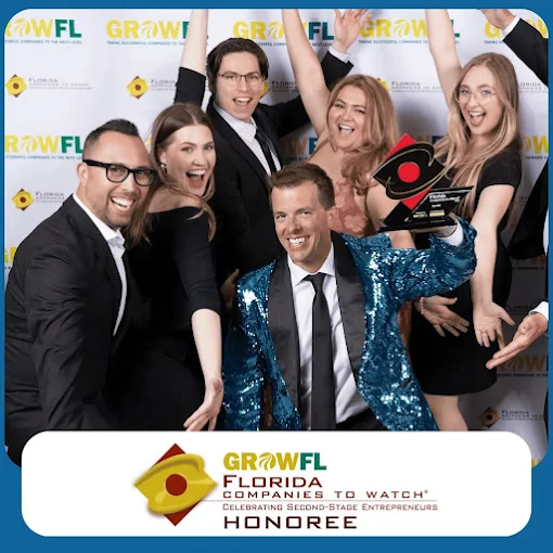 The Bambiz team celebrating a GrowFL Florida Companies to Watch honoree award