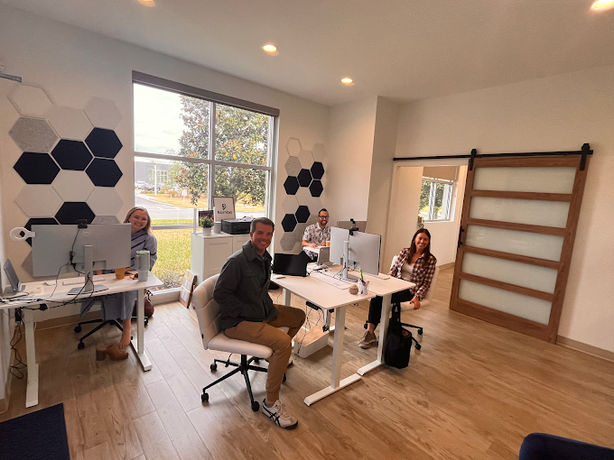 Bambiz team members working together in the office